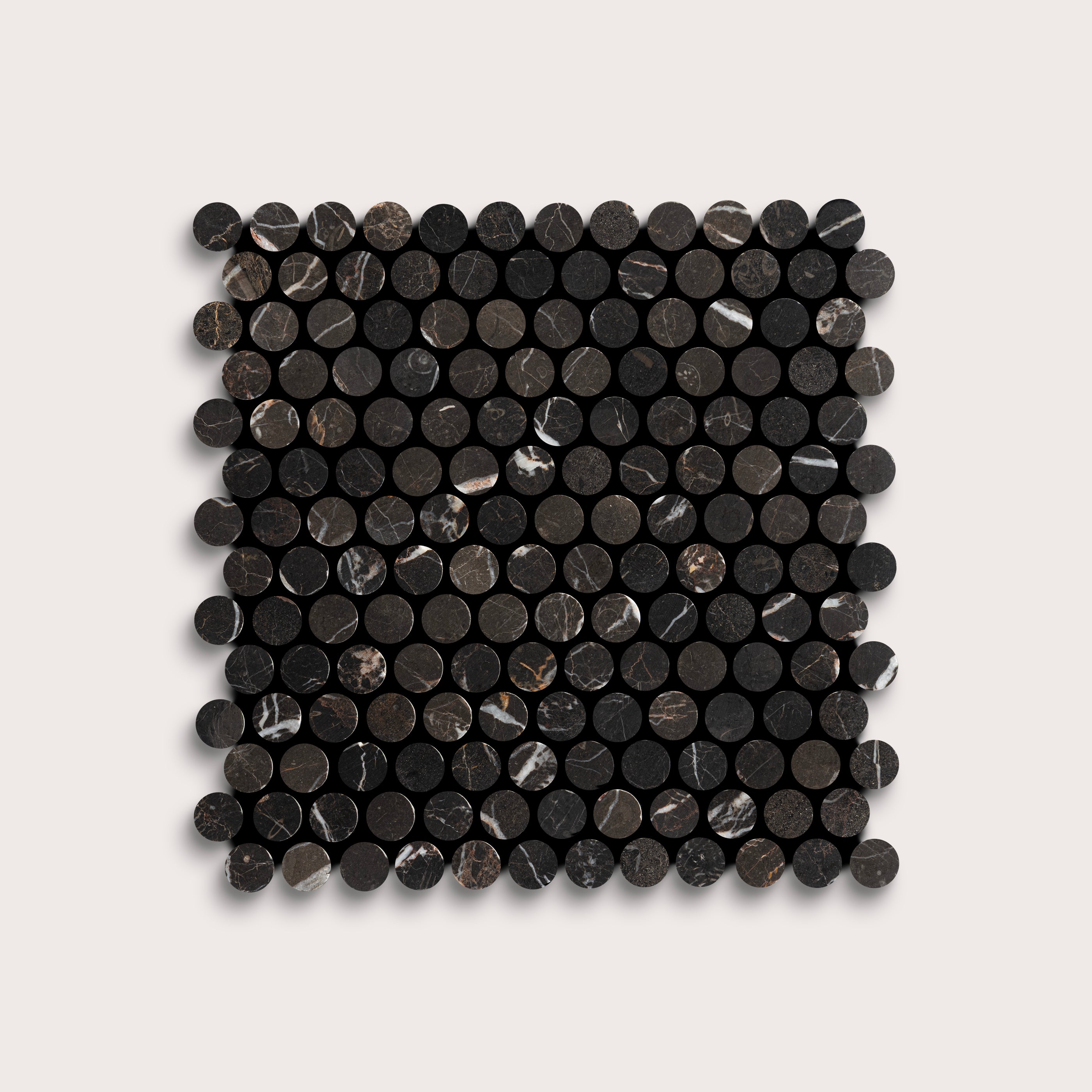 Square arrangement of black circular marble tiles on a light gray background
