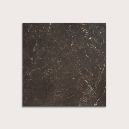 brown marble tiles with visible veins on a white background