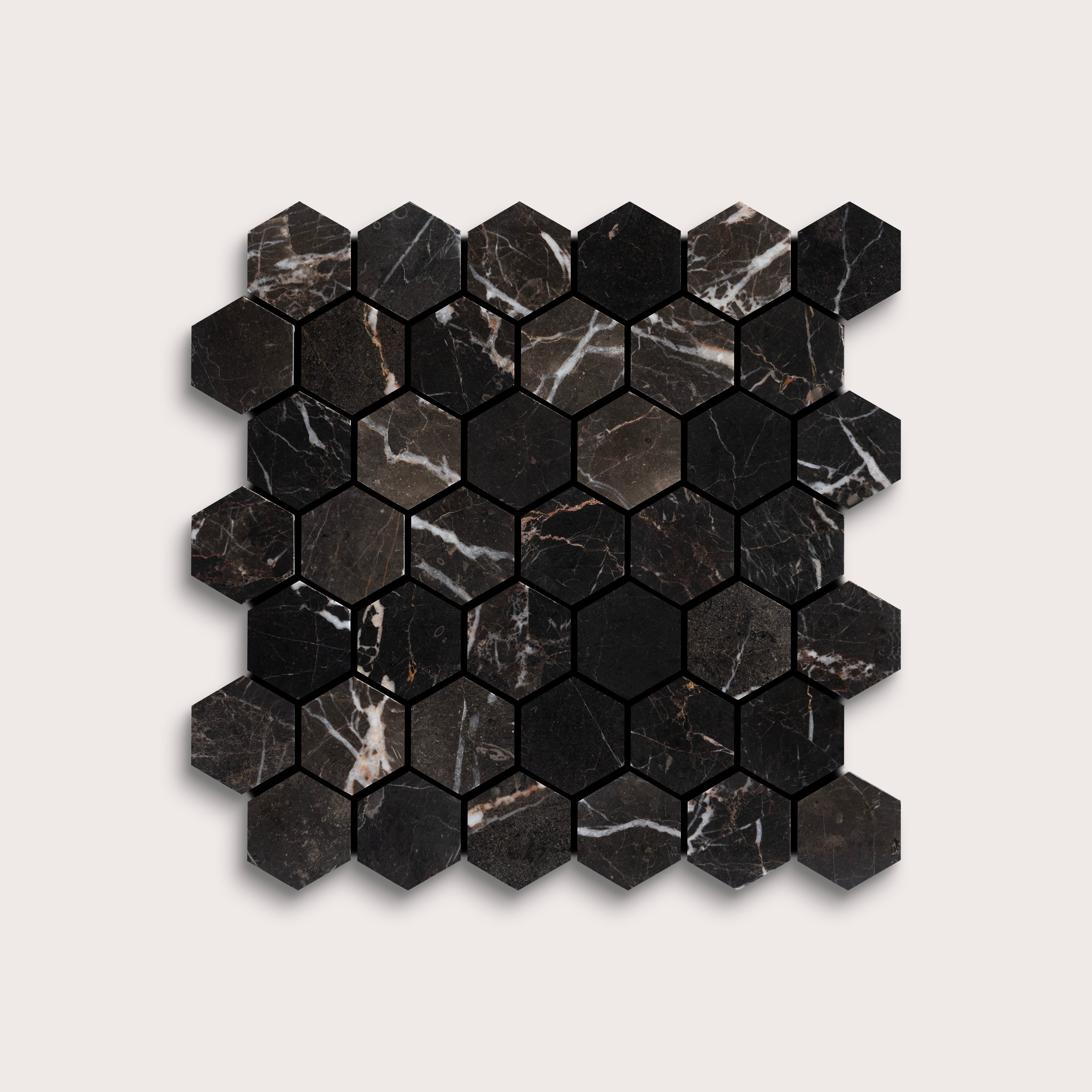 Hexagonal black marble tiles on a light gray background