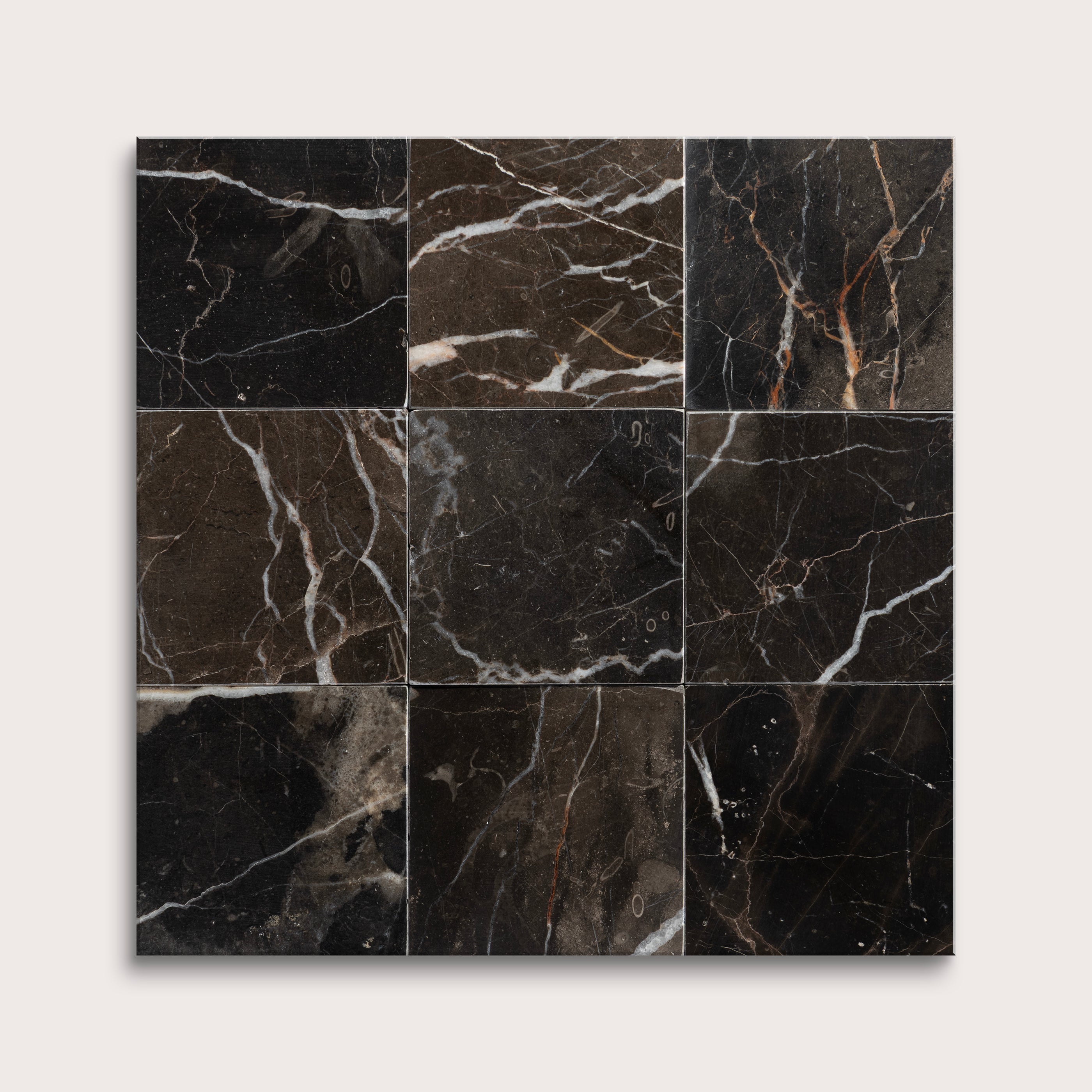 Square tile with black marble pattern on a white background