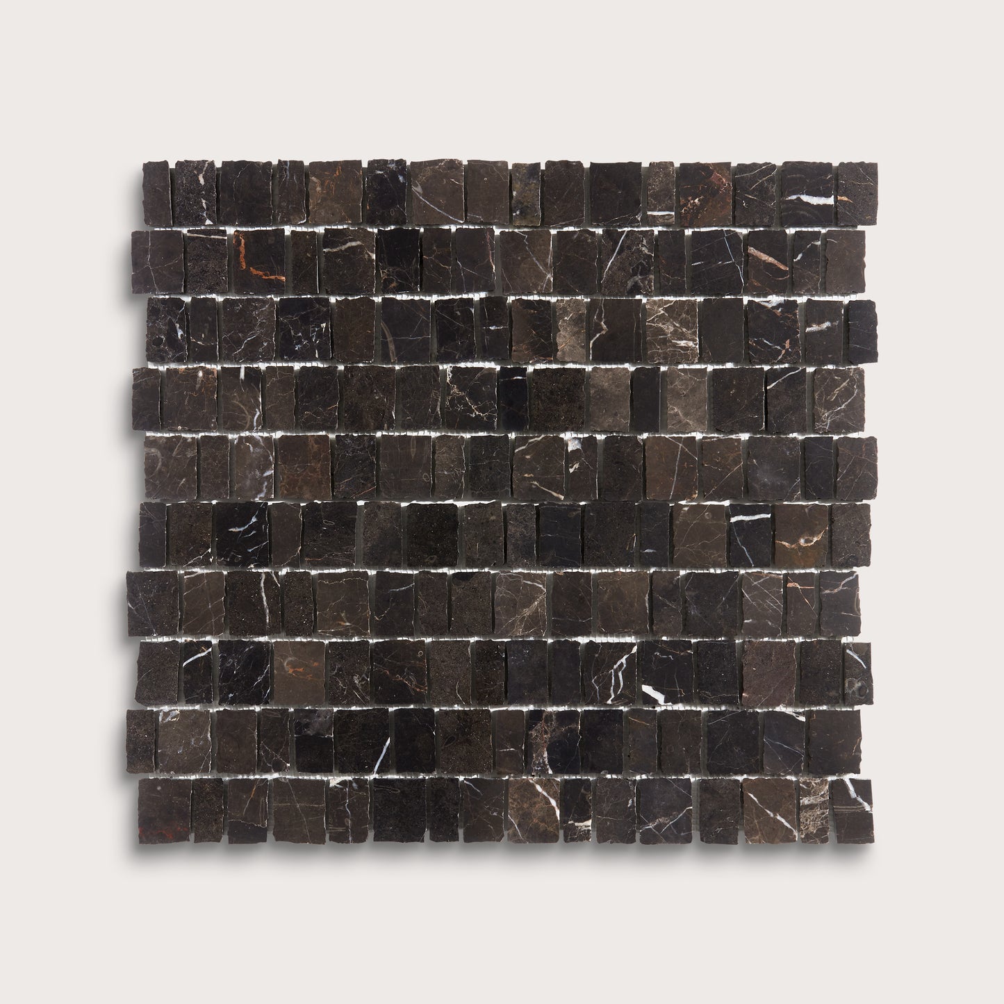 A square sample of dark marble mosaic tiles with natural white and brown veining, arranged in a grid pattern against a light gray background.
