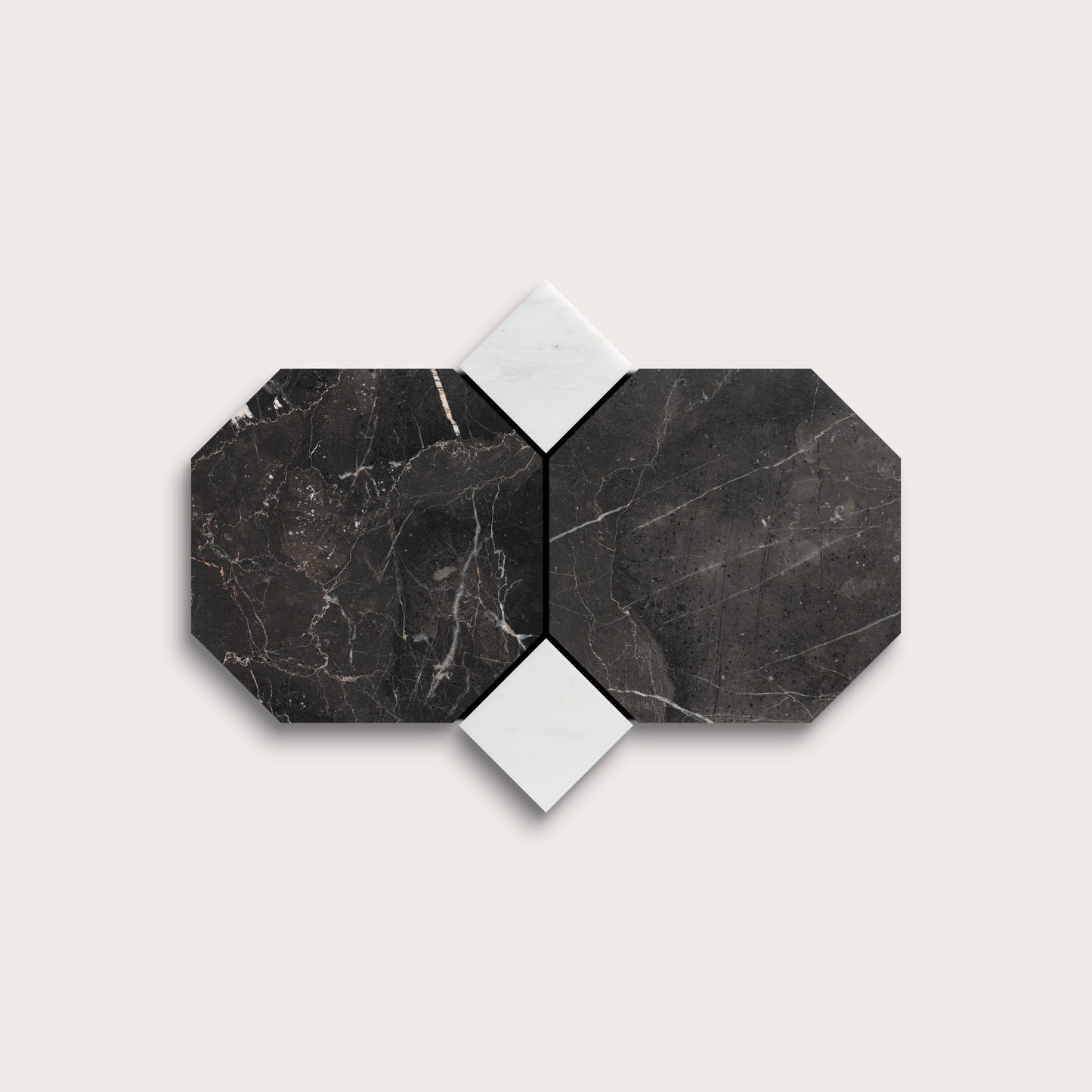 Hexagonal black marble tiles with white grout on a light gray background