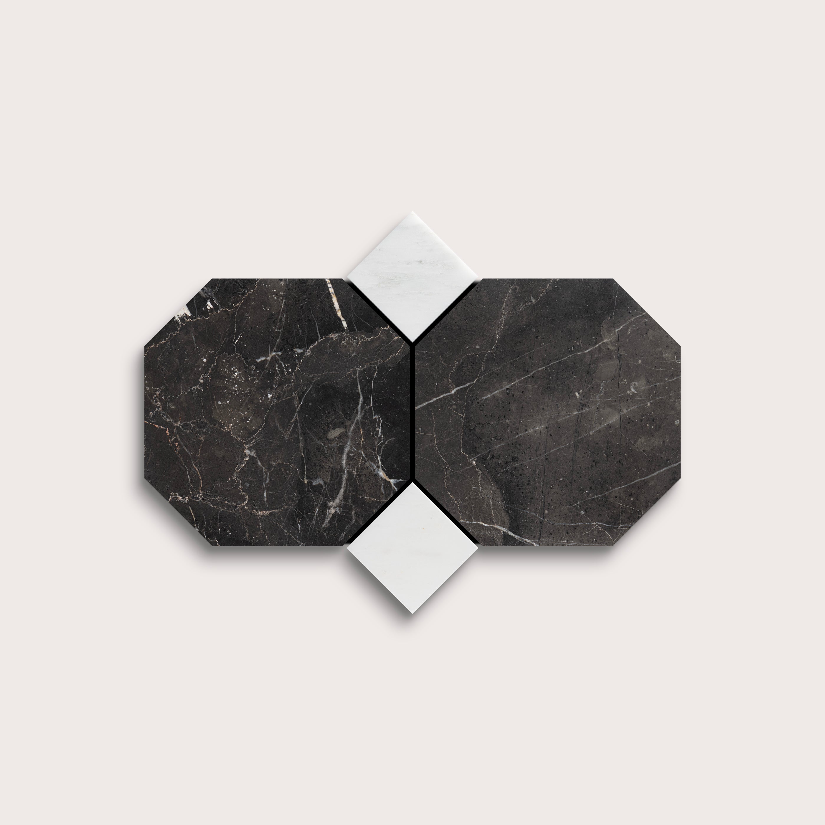 Hexagonal black marble tiles with white grout on a light gray background