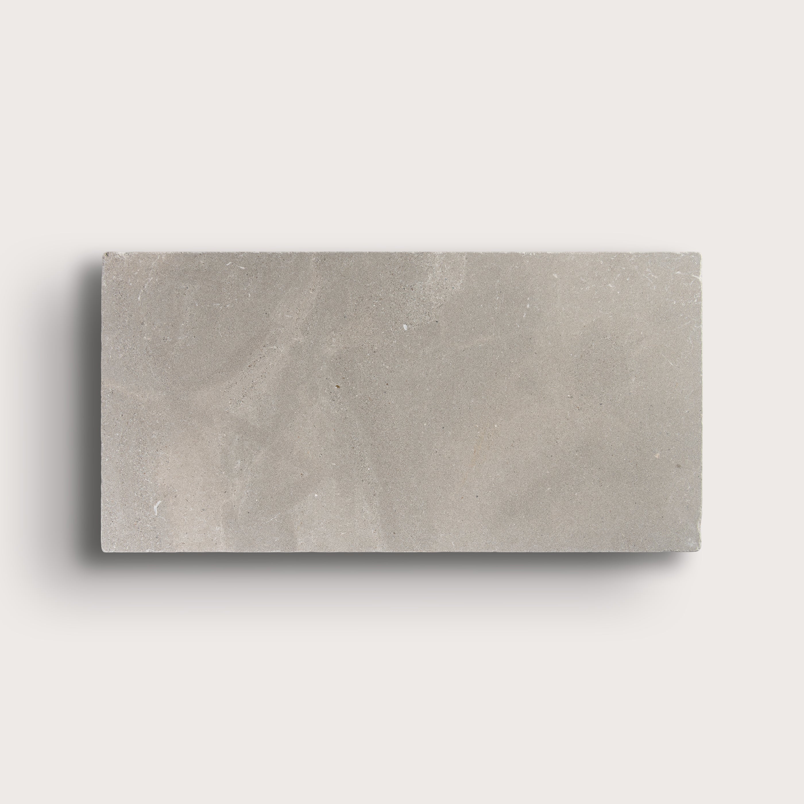 grey limestone rectangle tile on light grey background