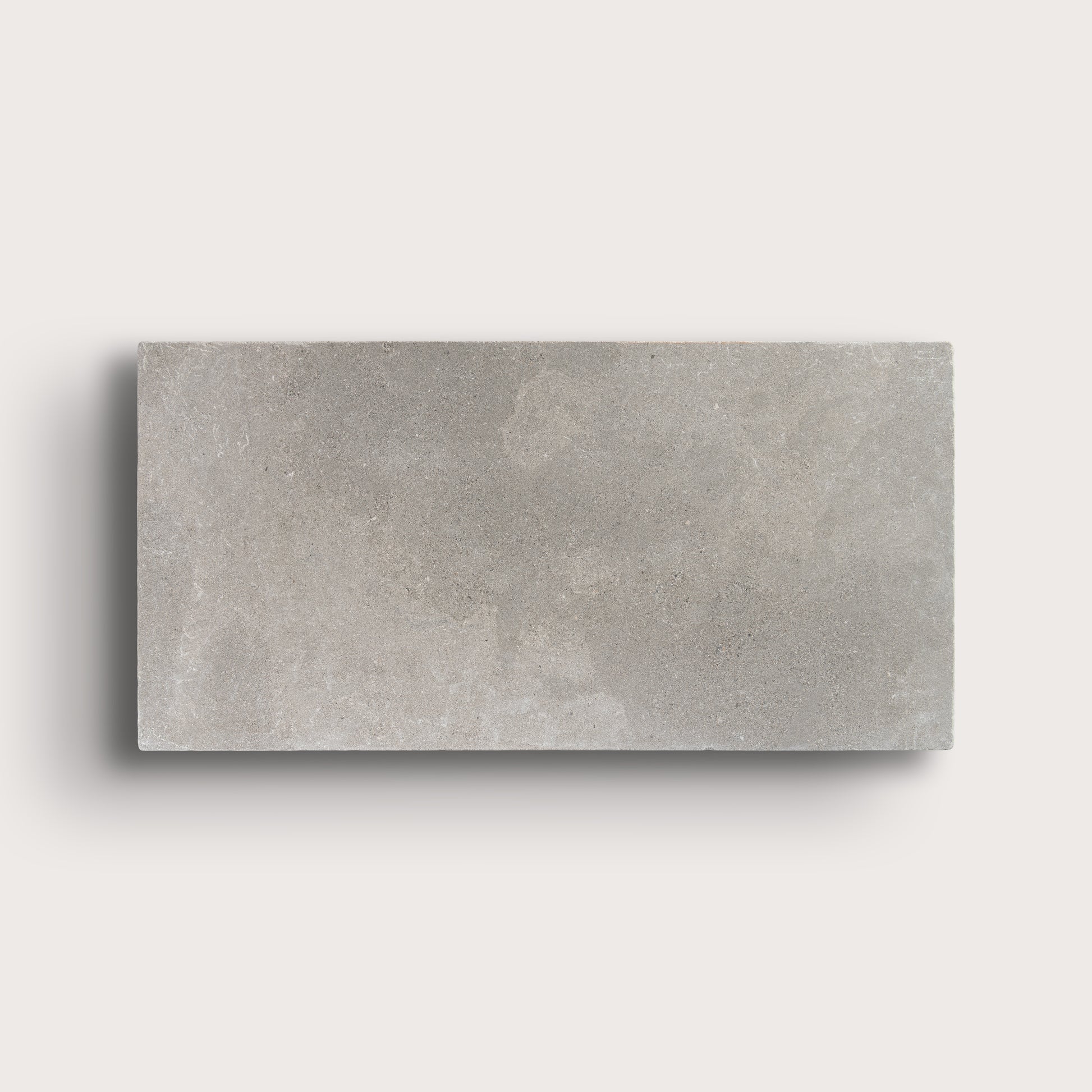 grey limestone rectangle tile on light grey background