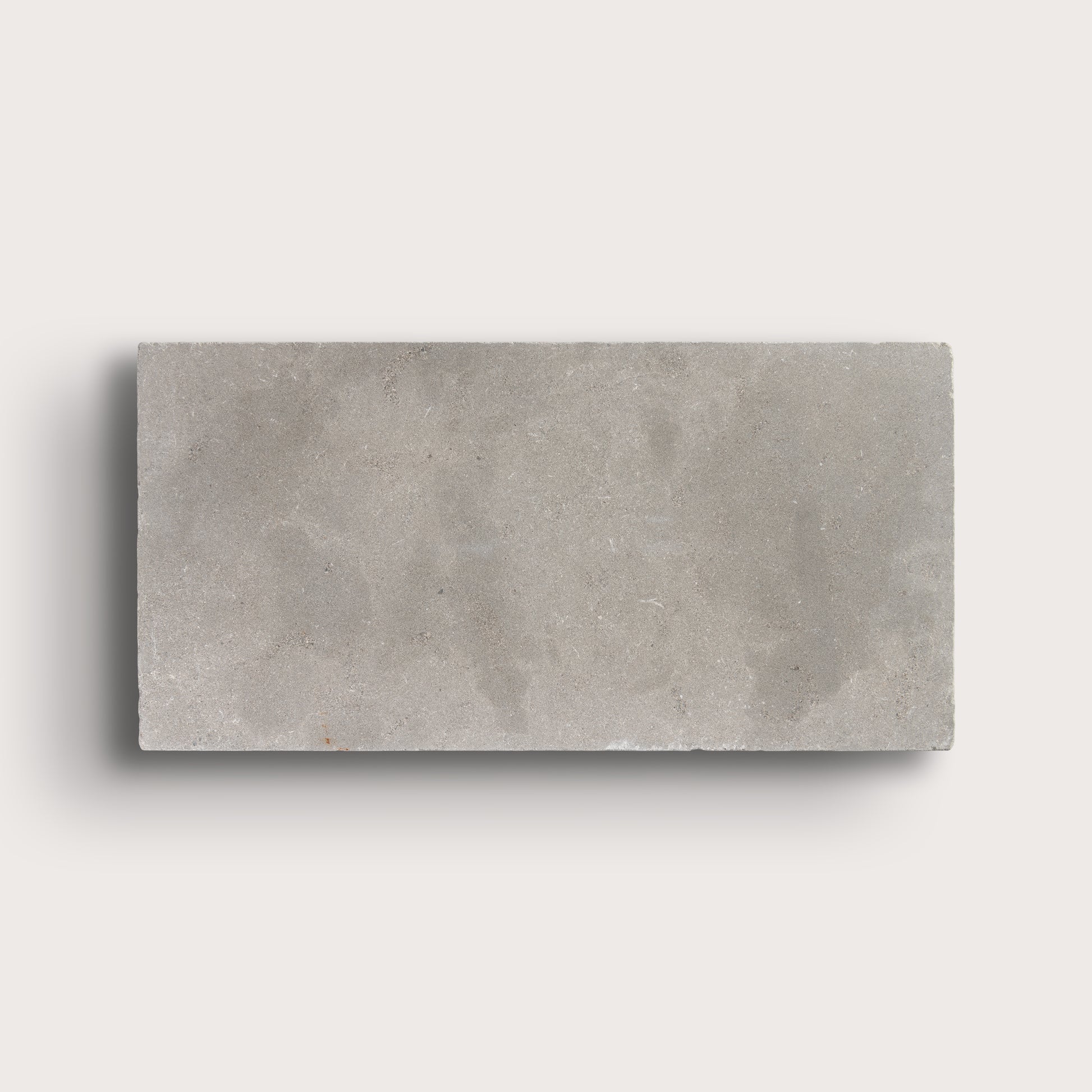 grey limestone rectangle tile on light grey background