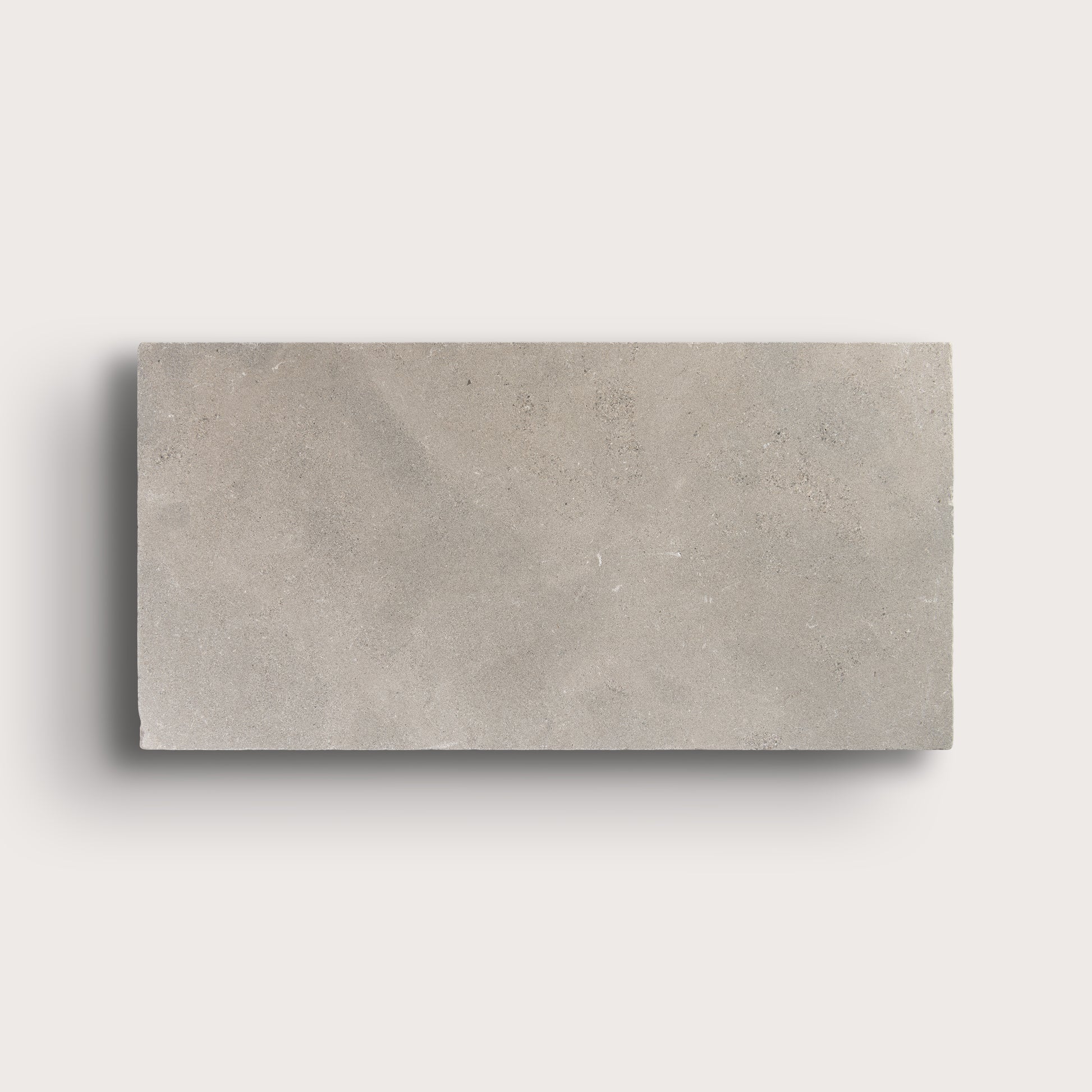 grey limestone rectangle tile on light grey background