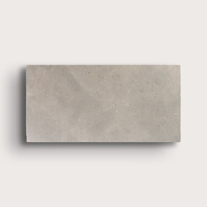 grey limestone rectangle tile on light grey background