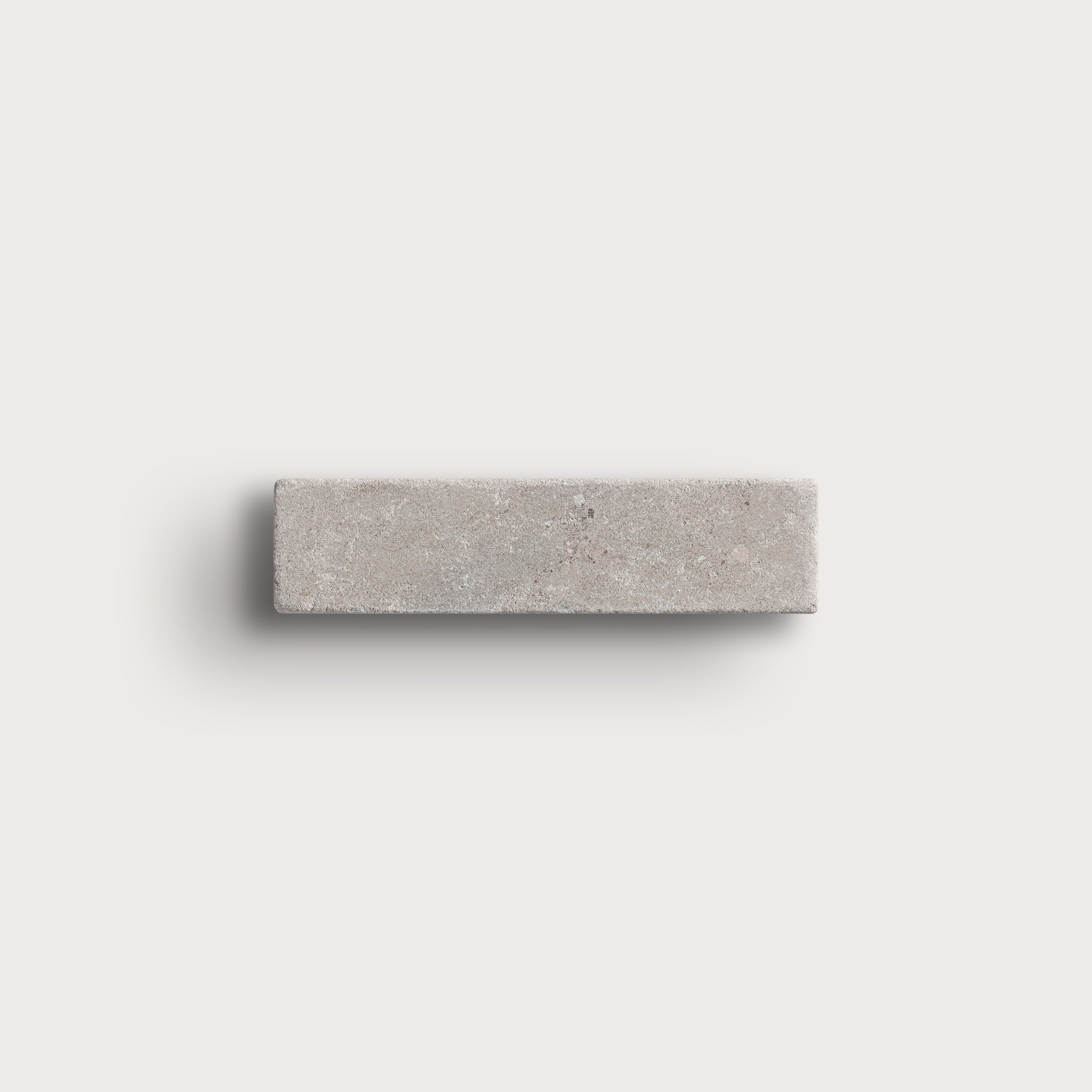 grey rectangle limestone tile on light grey background