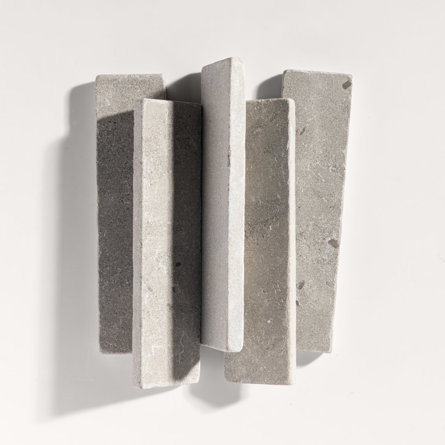grey rectangle limestone tile on light grey background