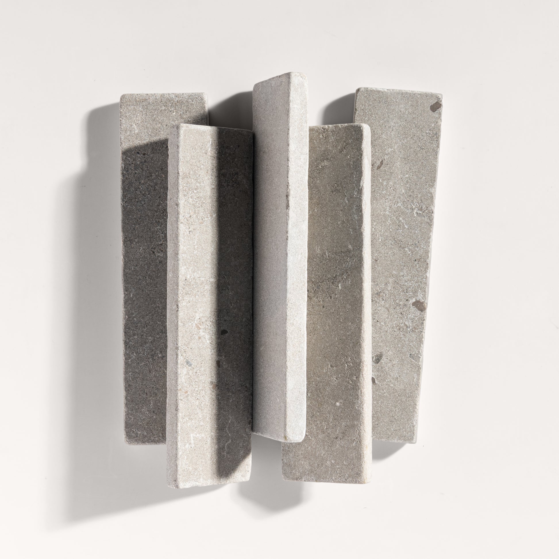 grey rectangle limestone tile on light grey background