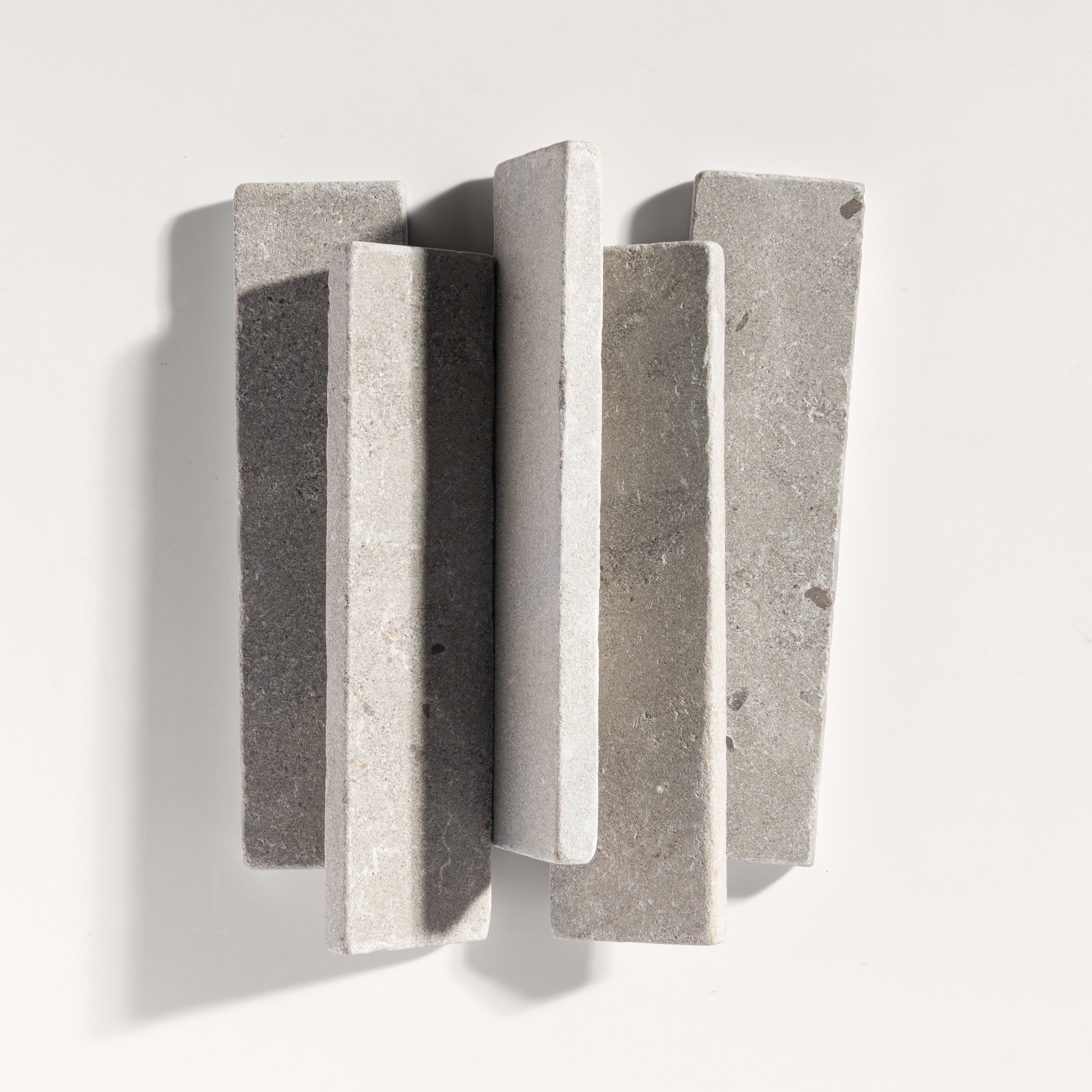 grey rectangle limestone tile on light grey background
