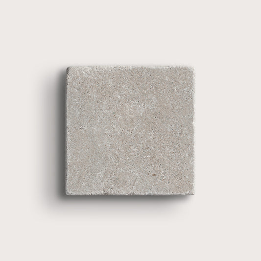 grey limestone square tile on light grey background