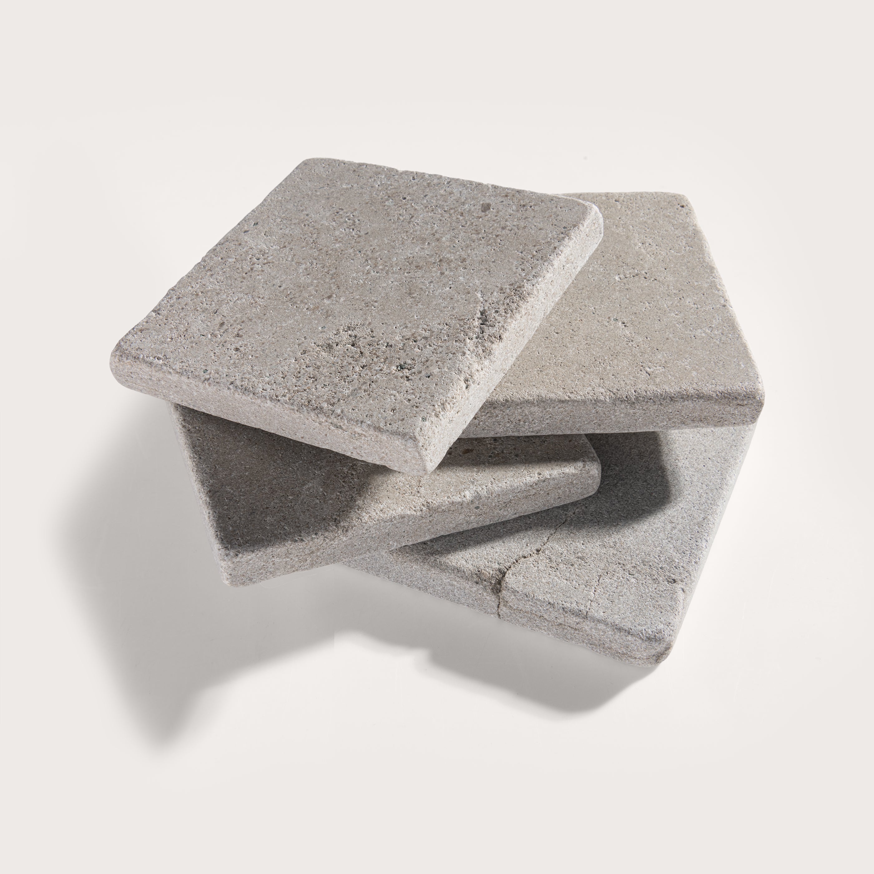 grey limestone square tile on light grey background