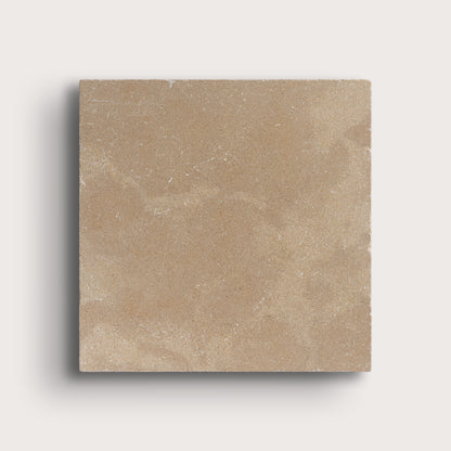 beige limestone tile on light grey background