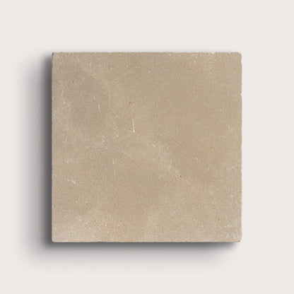 Beige square tile on a light gray background