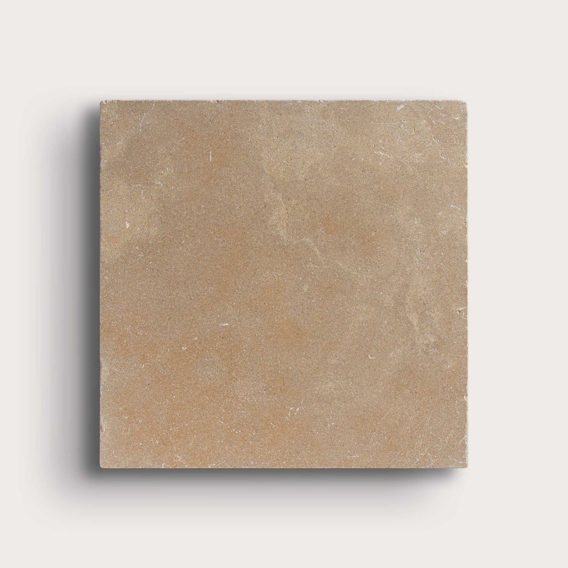 Beige square tile on a light gray background