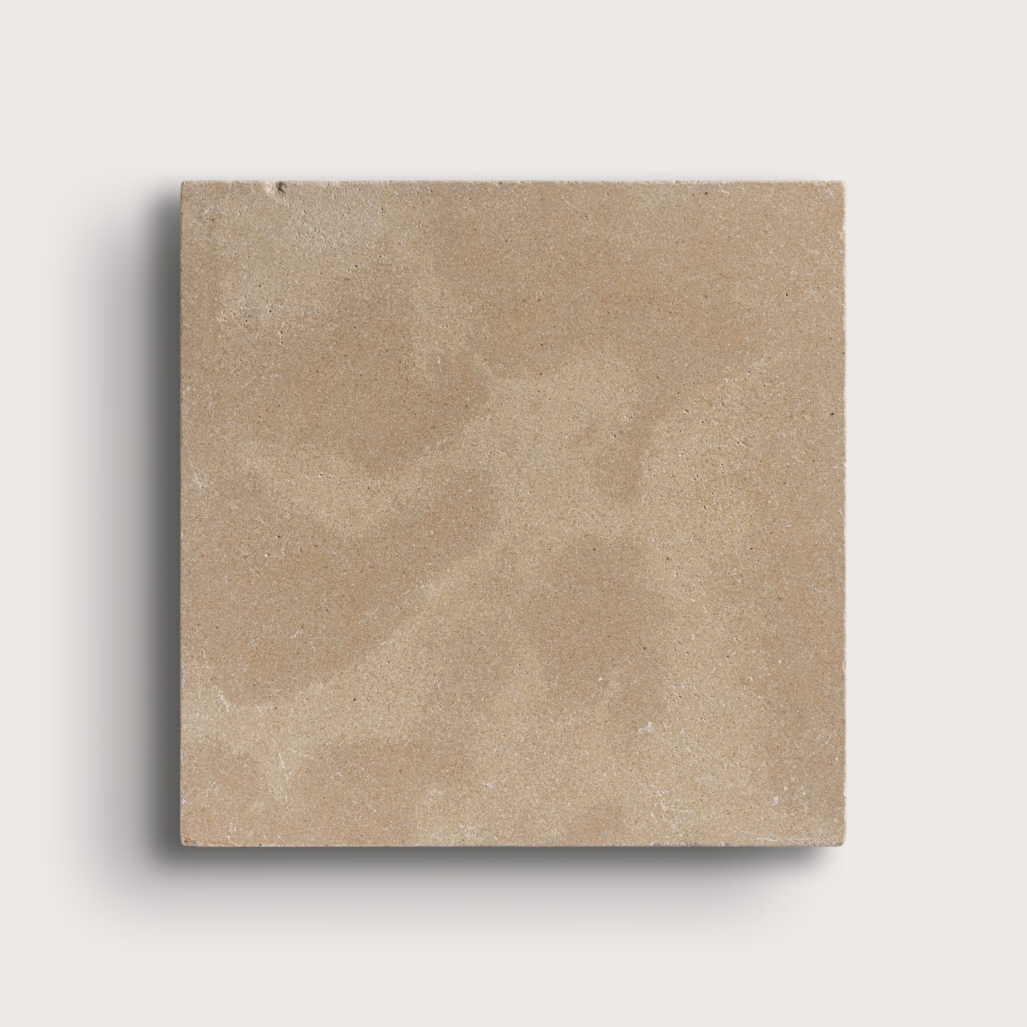 Beige square tile on a light gray background