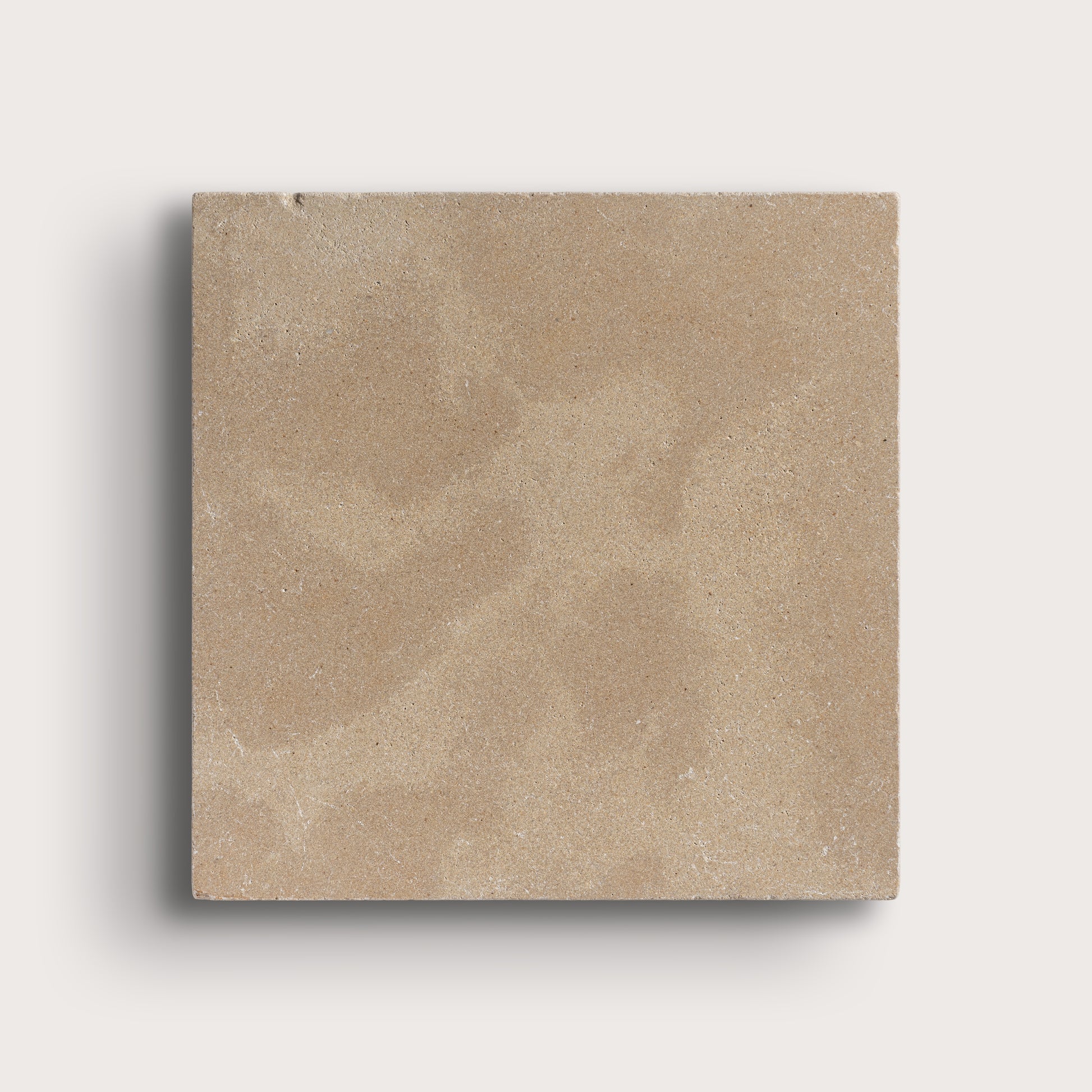 Beige square tile on a light gray background