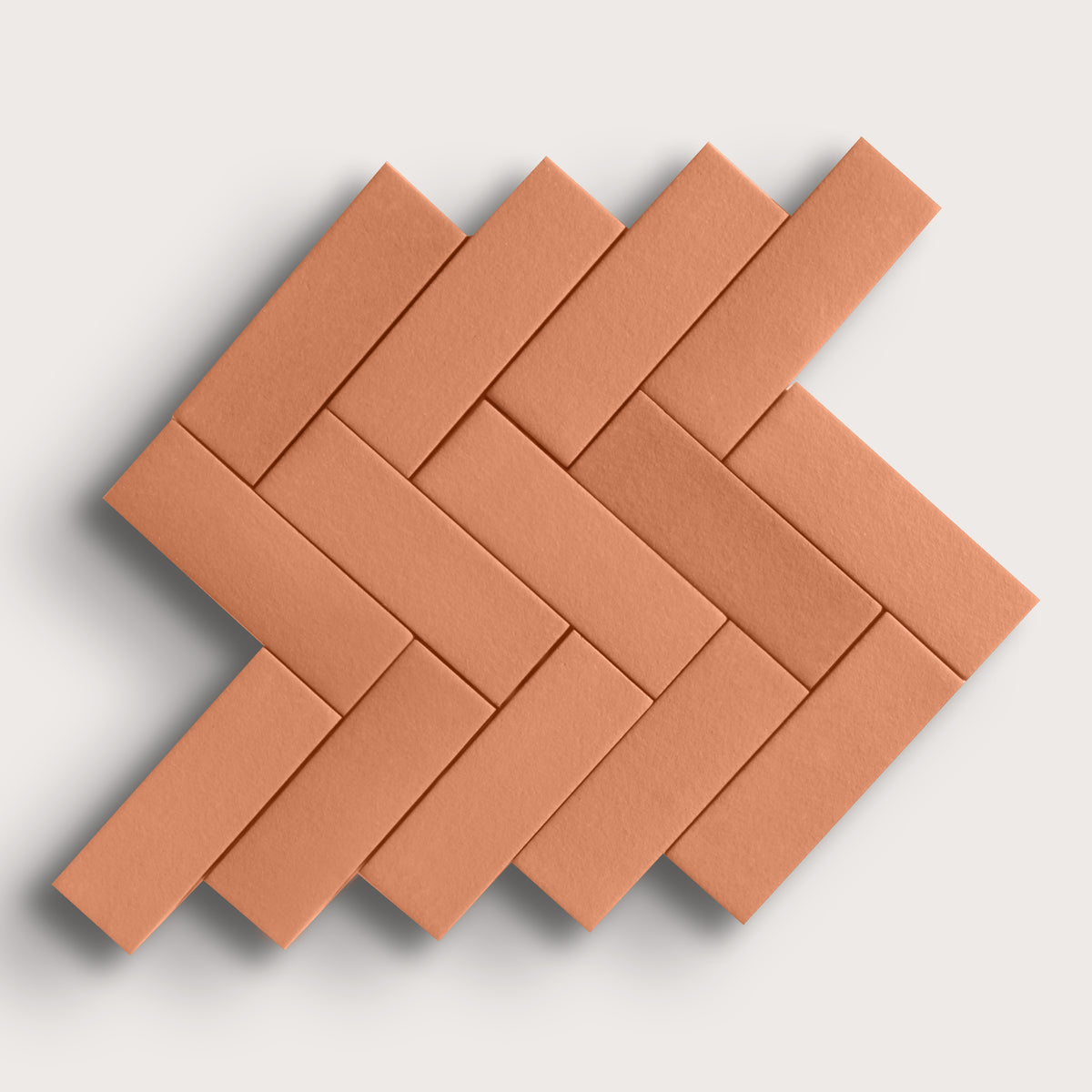 red terracotta rectangle tile in a herringbone pattern