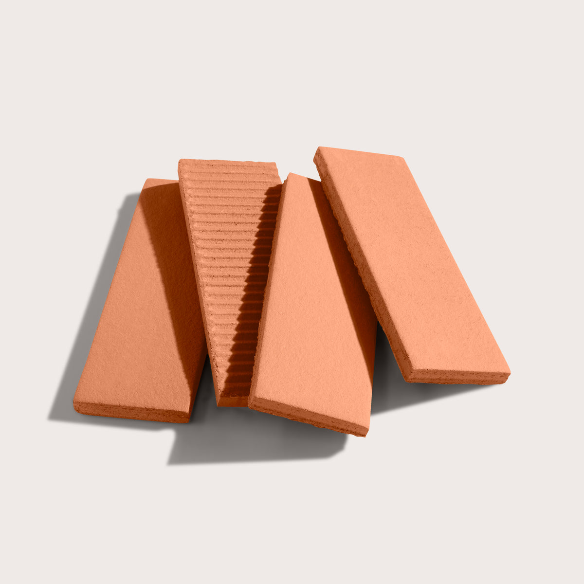 red terracotta rectangle tile in a stack