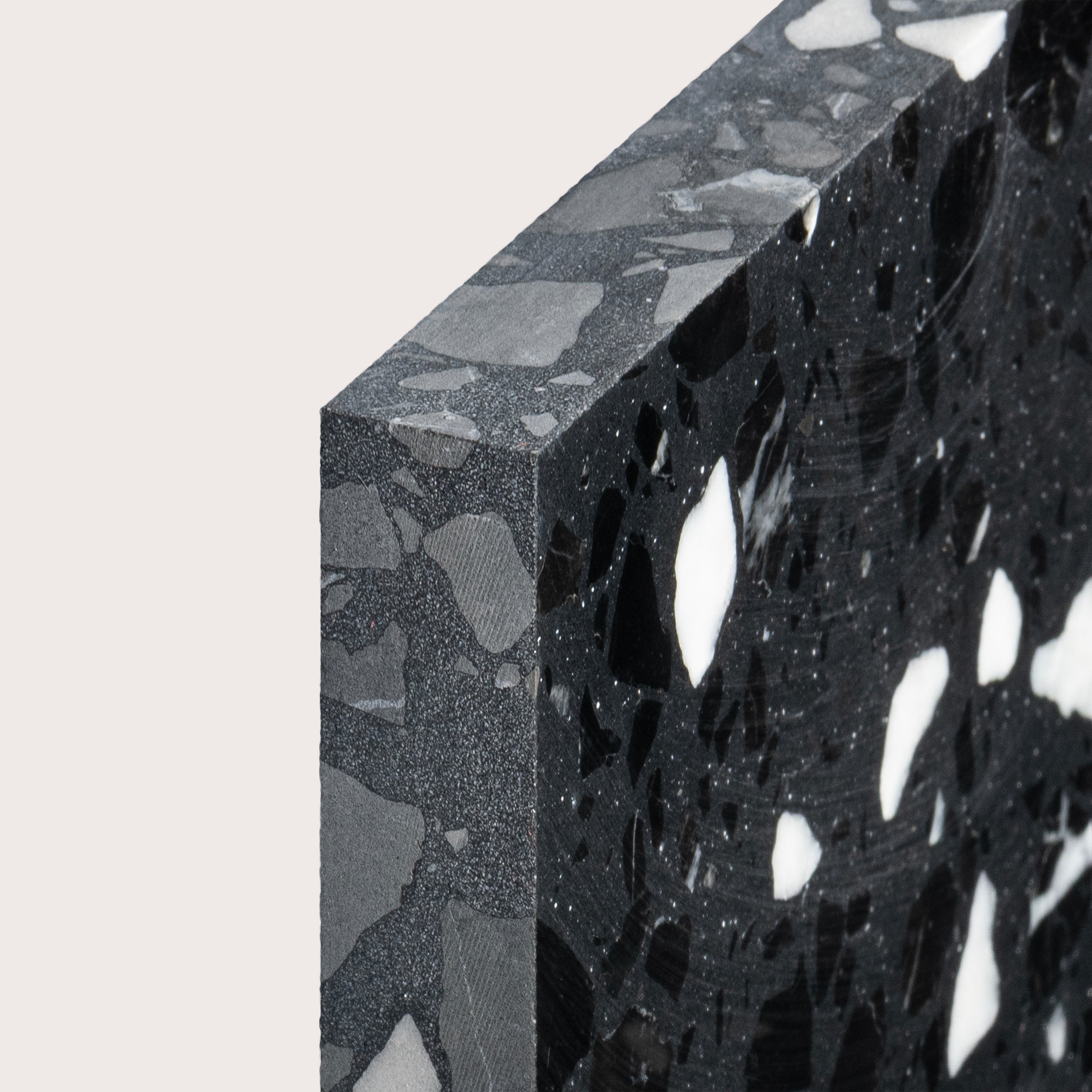 Black and white terrazzo tile in 6x6, pattern, close up of corner- Riad Tile