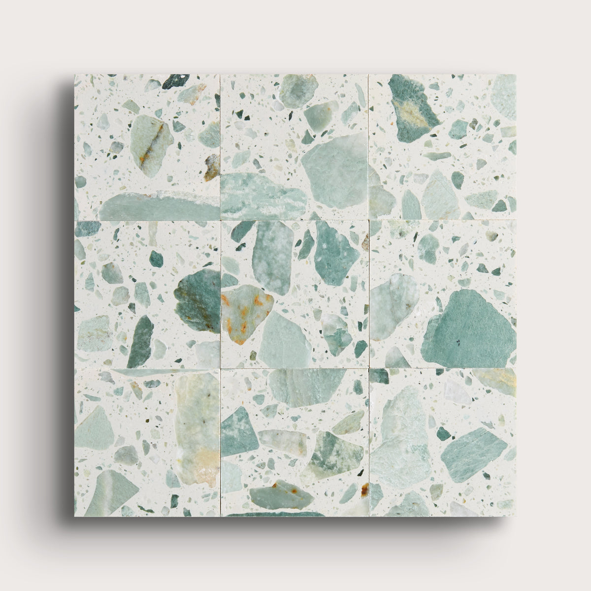 green terrazzo tile in a grid pattern
