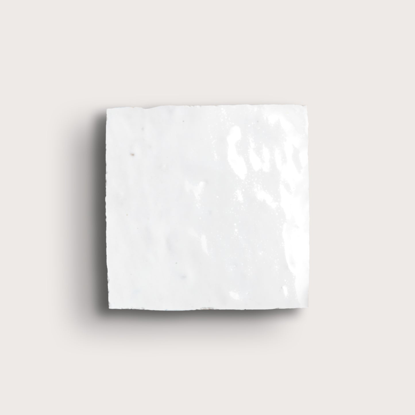 white zellige tile on a light grey background