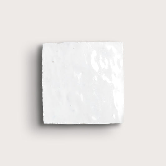 white zellige tile on a light grey background