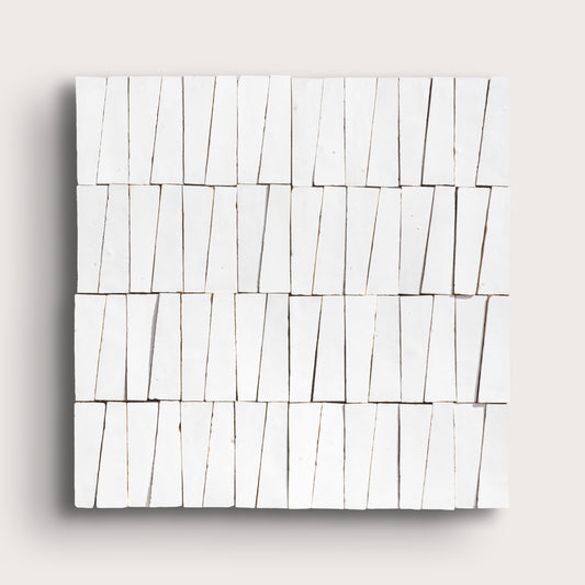 white zellige trapezoid design on a light gray background