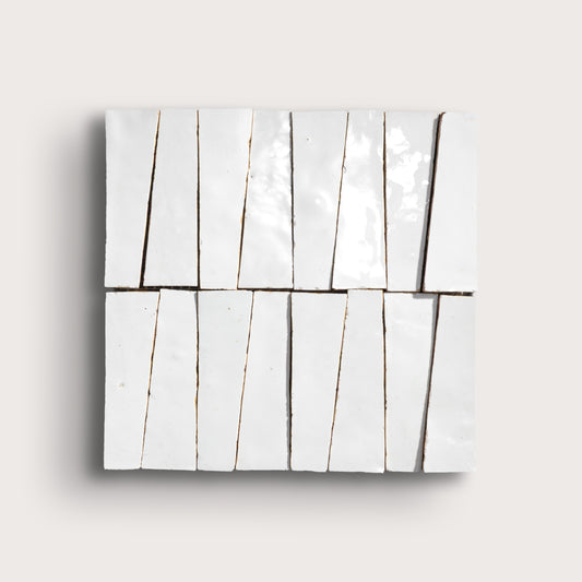 white zellige trapezoid design on a light gray background