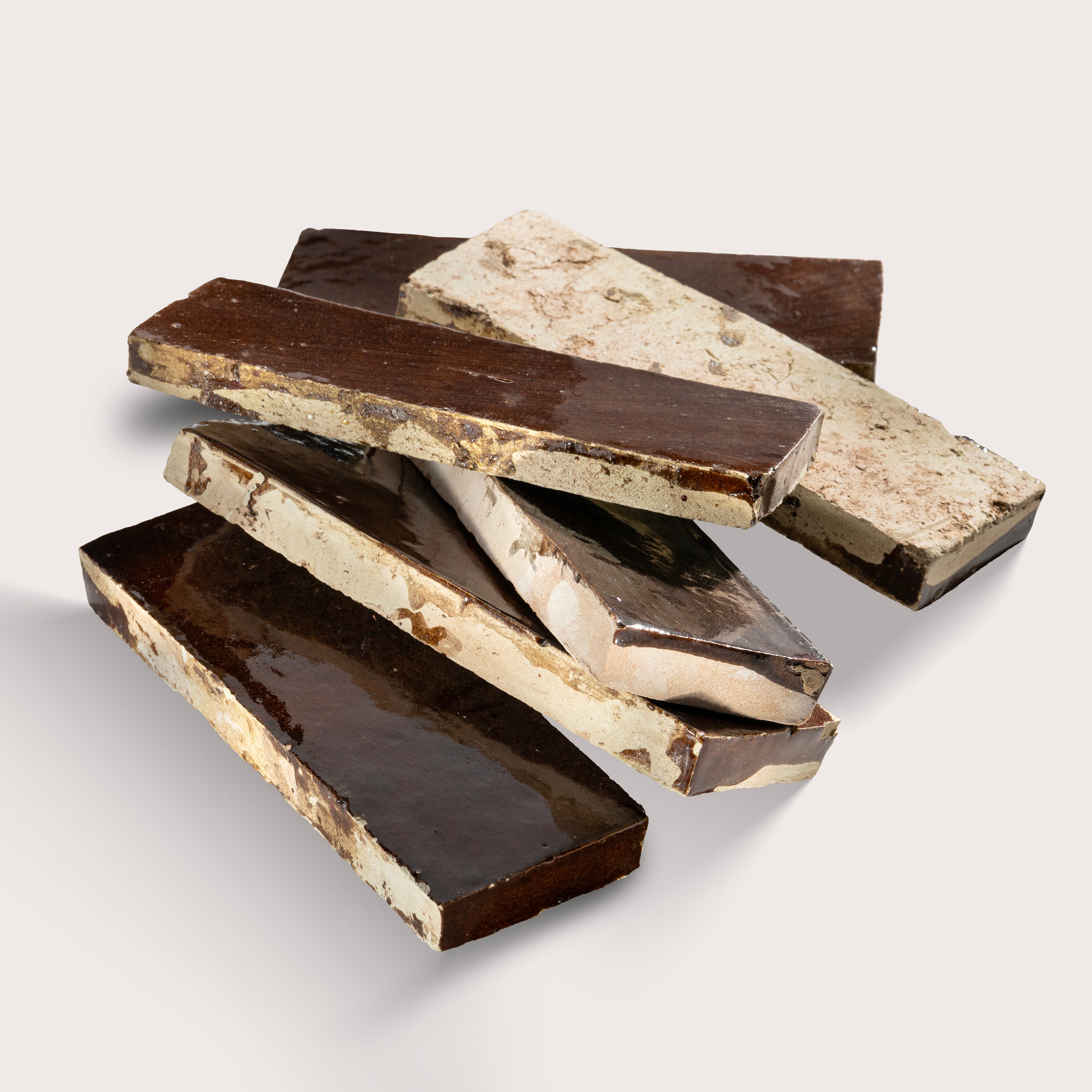 2x6 Rectangular dark chocolate zellige tile in a pile, solid, gloss - Riad Tile