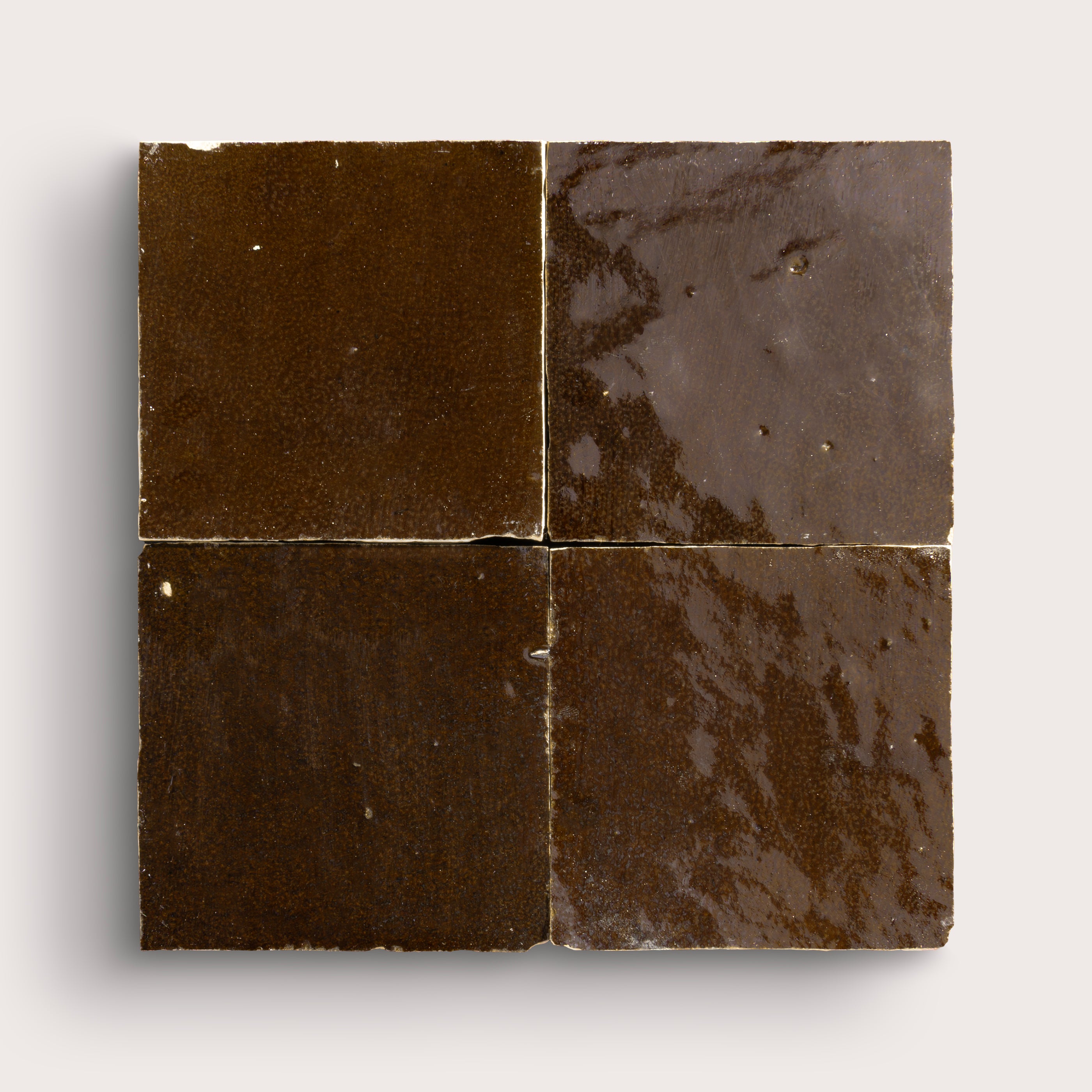 brown square zellige tile in grid pattern on a light grey background