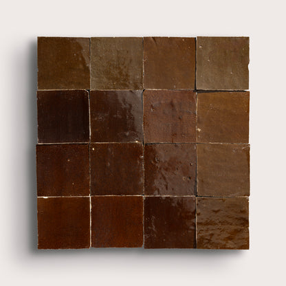 brown square zellige tile in grid pattern on a light grey background