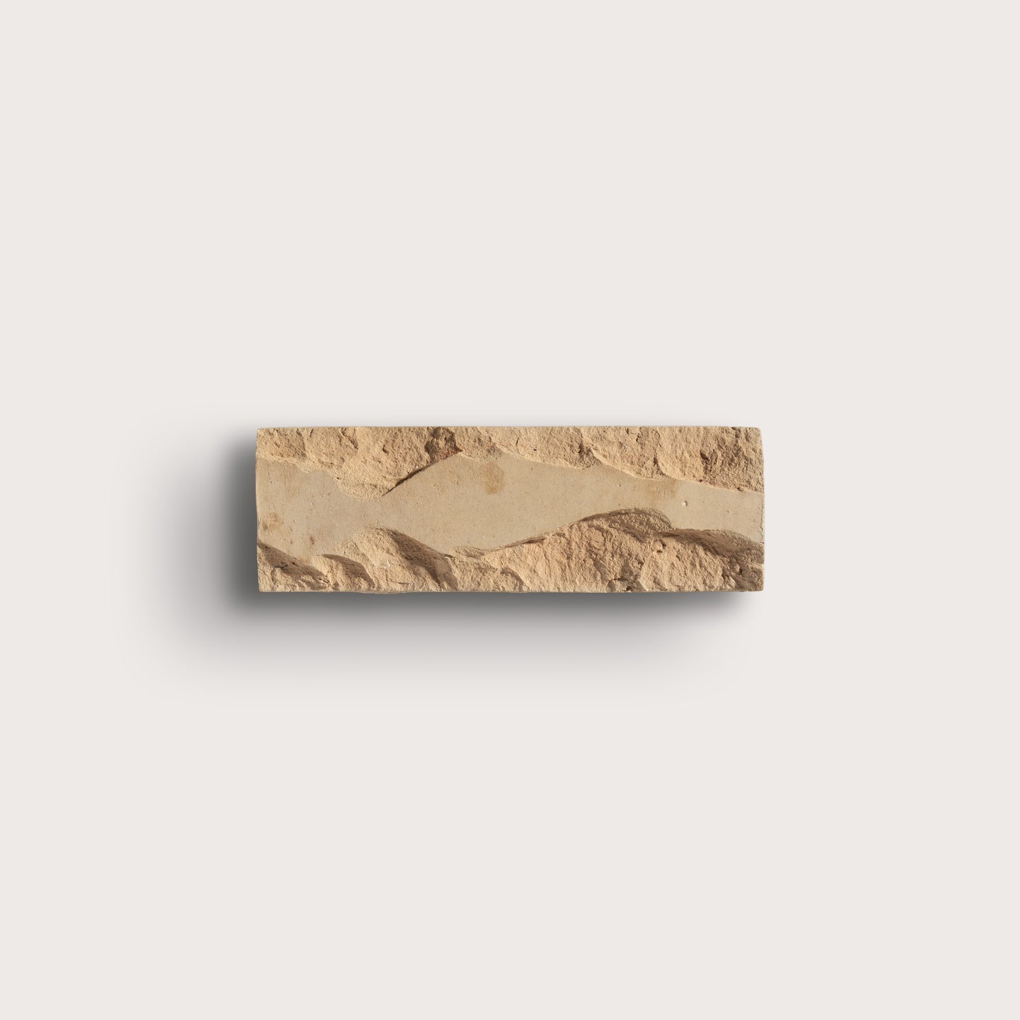 brown rectangle zellige tile on a gray background