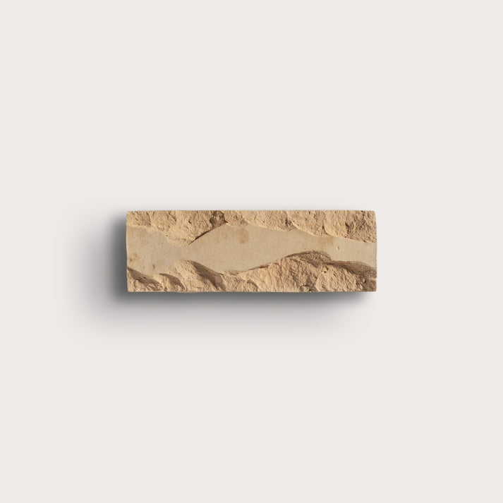 brown rectangle zellige tile on a gray background