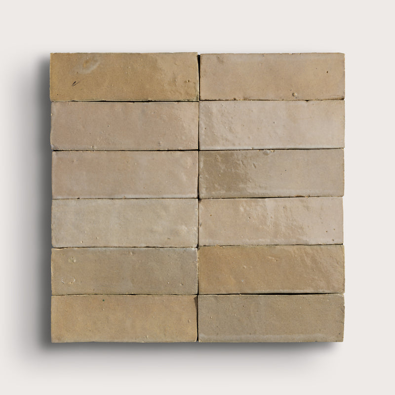 Set of zellige tiles arranged in a grid pattern on a white background