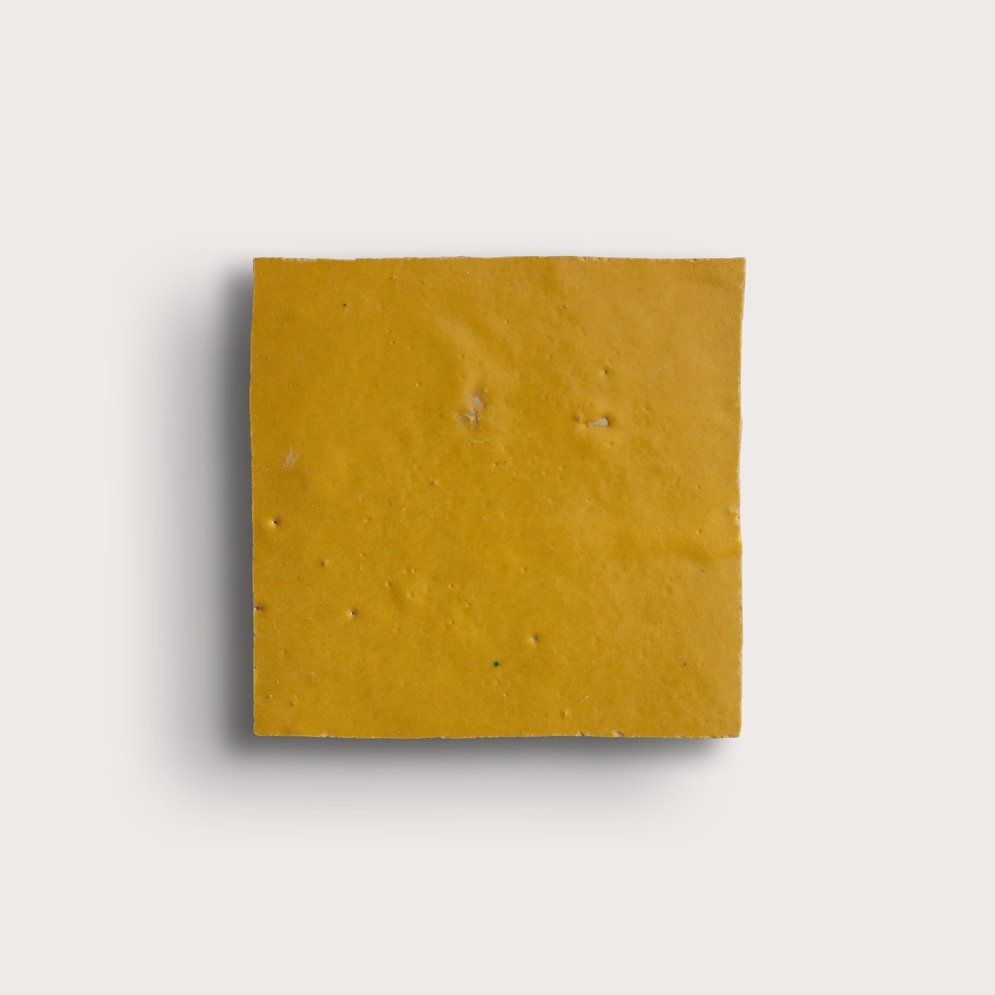 square zellige tile on light gray background