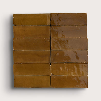 brown rectangle zellige tile on light gray background