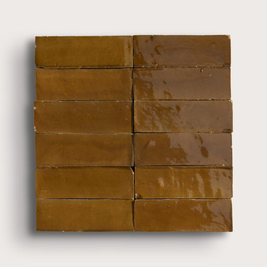 brown rectangle zellige tile on light gray background