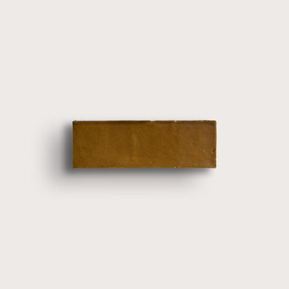 brown rectangle zellige tile on light gray background