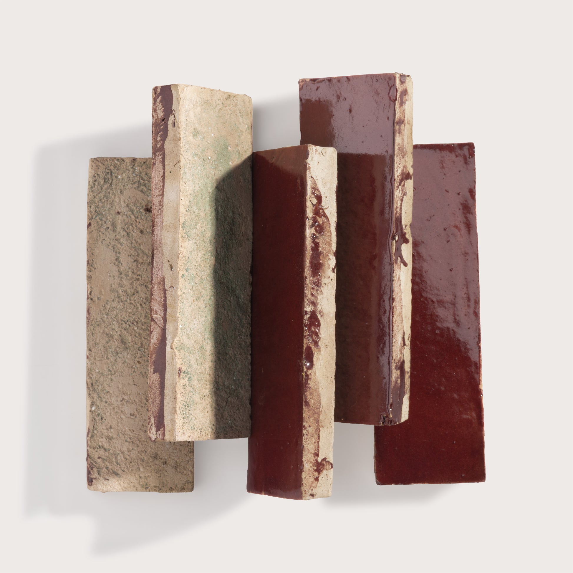 red rectangle zellige tile on light gray background