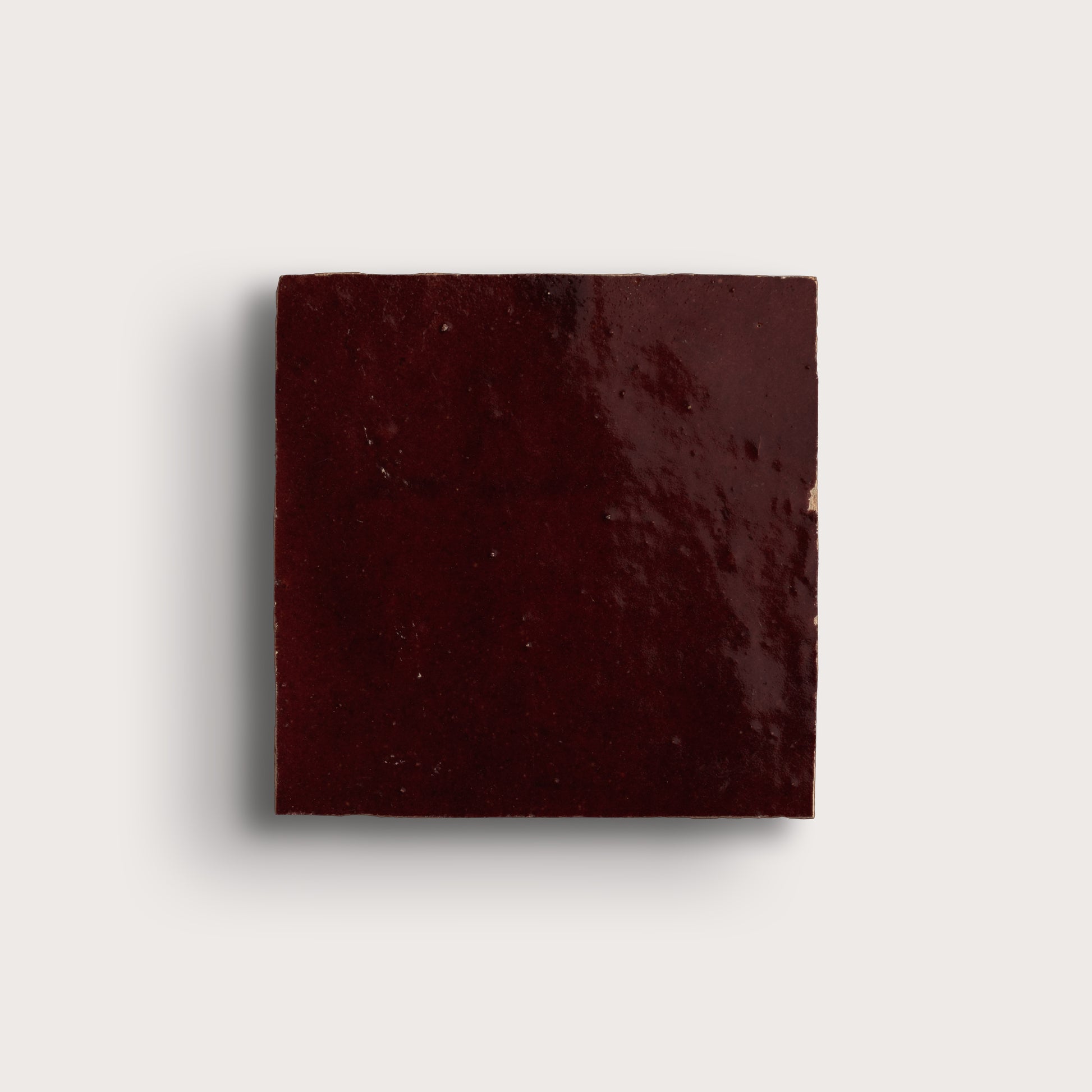 red square zellige tile on light gray background