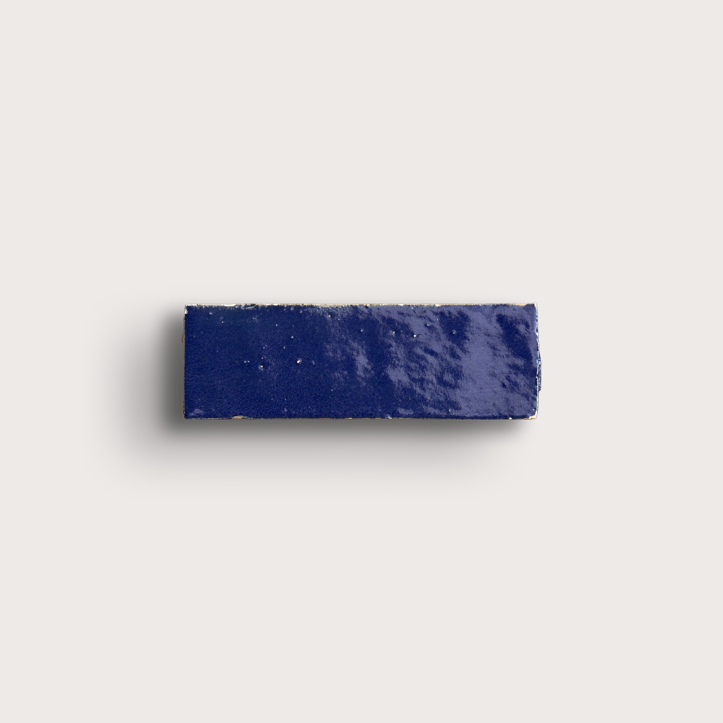 blue rectangle zellige tile on light grey background