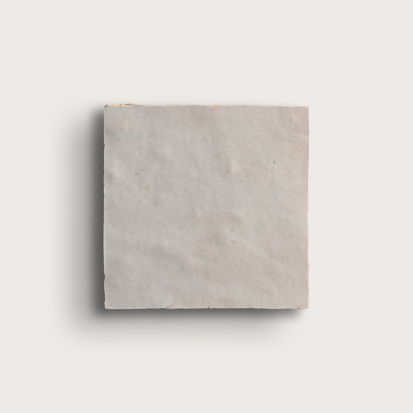 natural white square zellige tile on light grey background