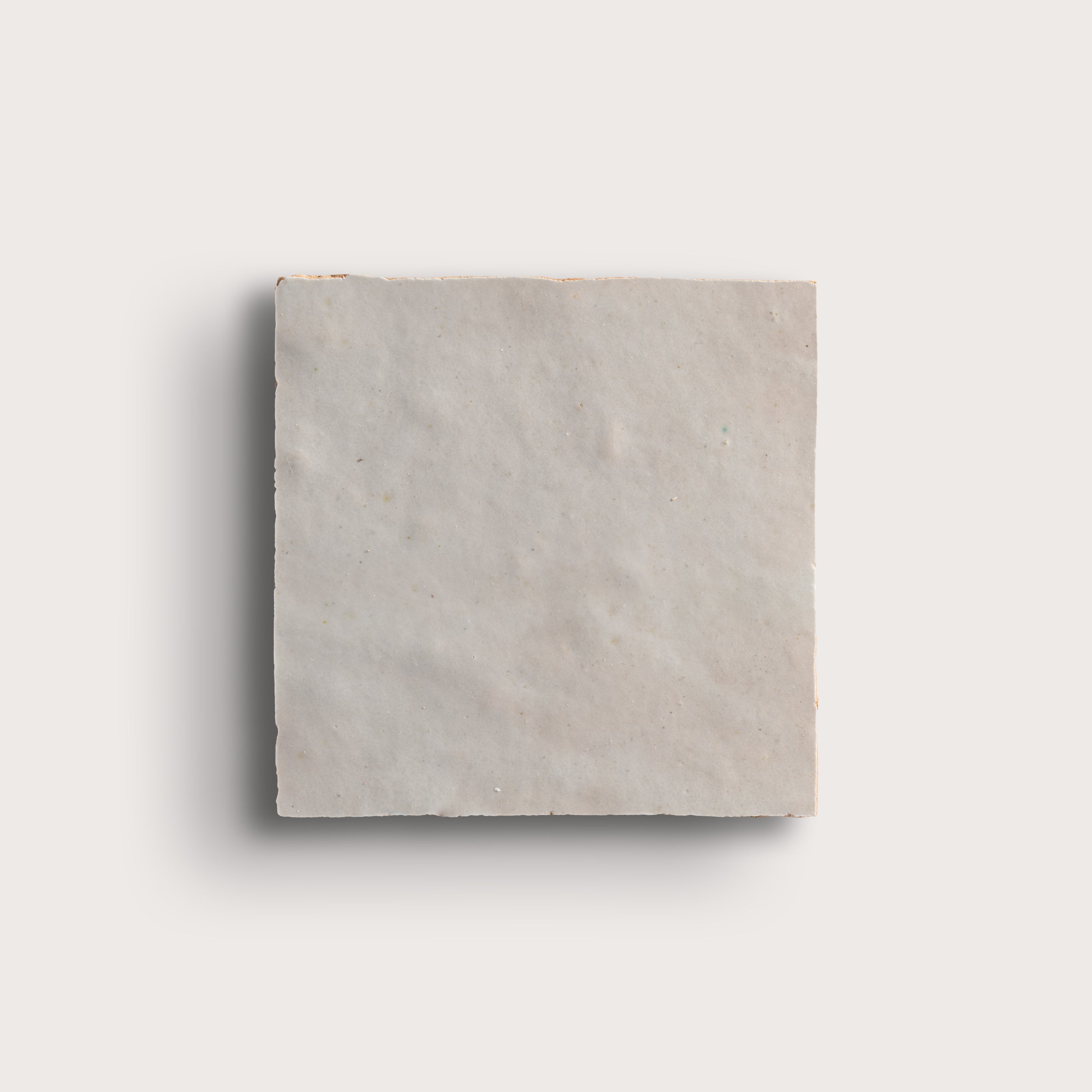 natural white square zellige tile on light grey background