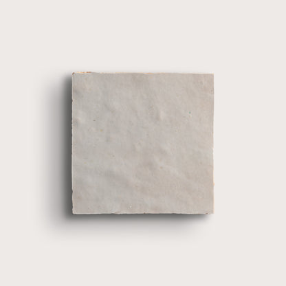 natural white square zellige tile on light grey background