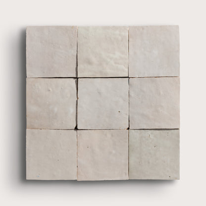 natural white square zellige tile arranged in grid on light grey background