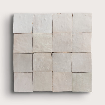 natural white square zellige tile arranged in grid on light grey background