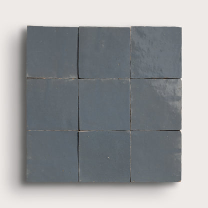 square zellige tiles in a grid on a light gray background